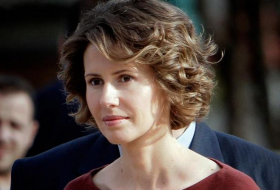 Syria`s first lady Asma Assad says she refused an offer to flee the country